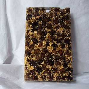 125 peppercorns and gold leaf in a resin block (rear view)