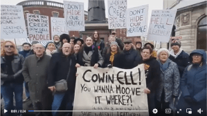A screengrab of the protesters with the finished placards